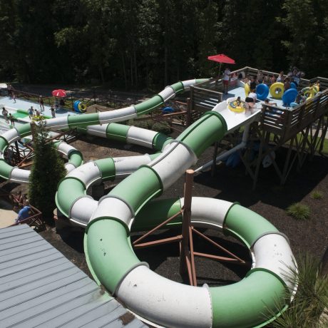Best waterpark and waterslides - Pirates Bay Waterpark in Leesburg AL (Northern Alabama), a sprawling aquatic playground located on a hilltop overlooking Weiss Lake. There’s fun for everyone with tube slides, body slides, multiple pools, waterfalls, splash playground, food, drinks, parties, and so much more!