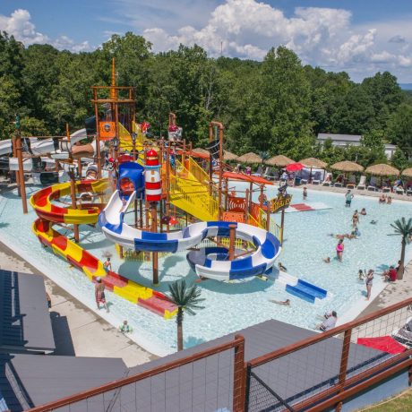Best waterpark and waterslides - Pirates Bay Waterpark in Leesburg AL (Northern Alabama), a sprawling aquatic playground located on a hilltop overlooking Weiss Lake. There’s fun for everyone with tube slides, body slides, multiple pools, waterfalls, splash playground, food, drinks, parties, and so much more!