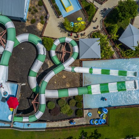 Best waterpark and waterslides - Pirates Bay Waterpark in Leesburg AL (Northern Alabama), a sprawling aquatic playground located on a hilltop overlooking Weiss Lake. There’s fun for everyone with tube slides, body slides, multiple pools, waterfalls, splash playground, food, drinks, parties, and so much more!