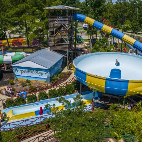 Best waterpark and waterslides - Pirates Bay Waterpark in Leesburg AL (Northern Alabama), a sprawling aquatic playground located on a hilltop overlooking Weiss Lake. There’s fun for everyone with tube slides, body slides, multiple pools, waterfalls, splash playground, food, drinks, parties, and so much more!