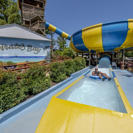 Best waterpark and waterslides - Pirates Bay Waterpark in Leesburg AL (Northern Alabama), a sprawling aquatic playground located on a hilltop overlooking Weiss Lake. There’s fun for everyone with tube slides, body slides, multiple pools, waterfalls, splash playground, food, drinks, parties, and so much more!