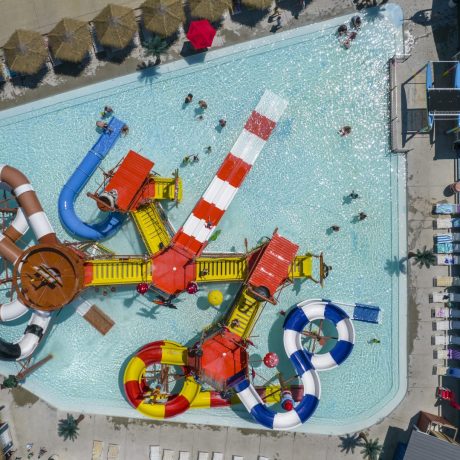 Best waterpark and waterslides - Pirates Bay Waterpark in Leesburg AL (Northern Alabama), a sprawling aquatic playground located on a hilltop overlooking Weiss Lake. There’s fun for everyone with tube slides, body slides, multiple pools, waterfalls, splash playground, food, drinks, parties, and so much more!